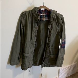 Army green jacket with flannel details